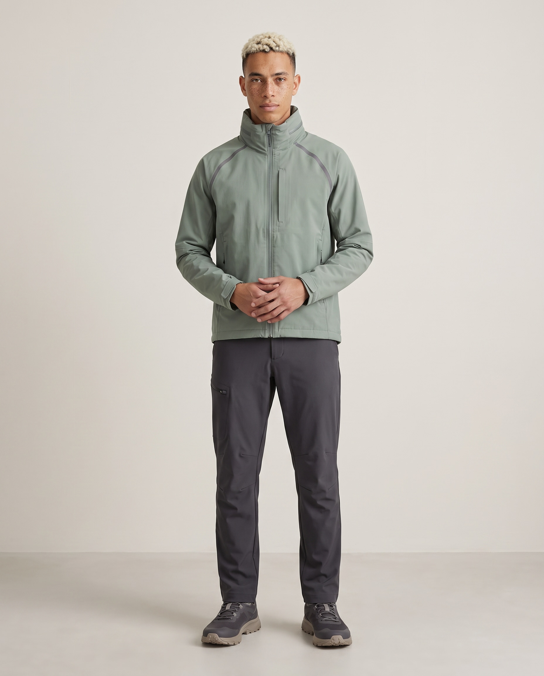 Oren wearing the three-piece trail system in a clean product-page frame using the Gentle Standing pose